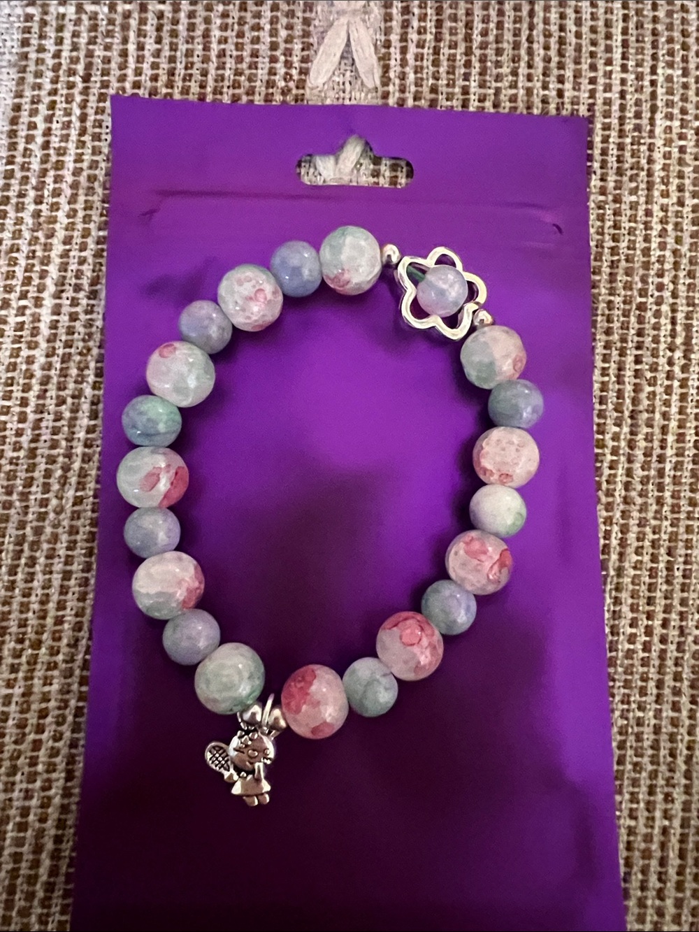 Handmade glass bead bracelet with bunny charm